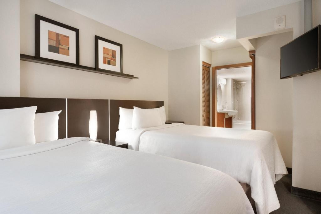 Embassy Suites By Hilton Downtown Montreal  Rooms  2 Room Suite With 2 Double Beds Fireplace Mobility Accessible Bed 23