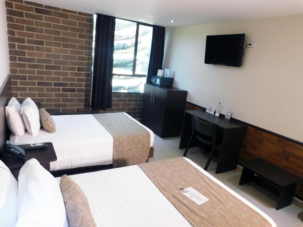 Hotel Acqua Medellin  Rooms  Standard Twin Room 11