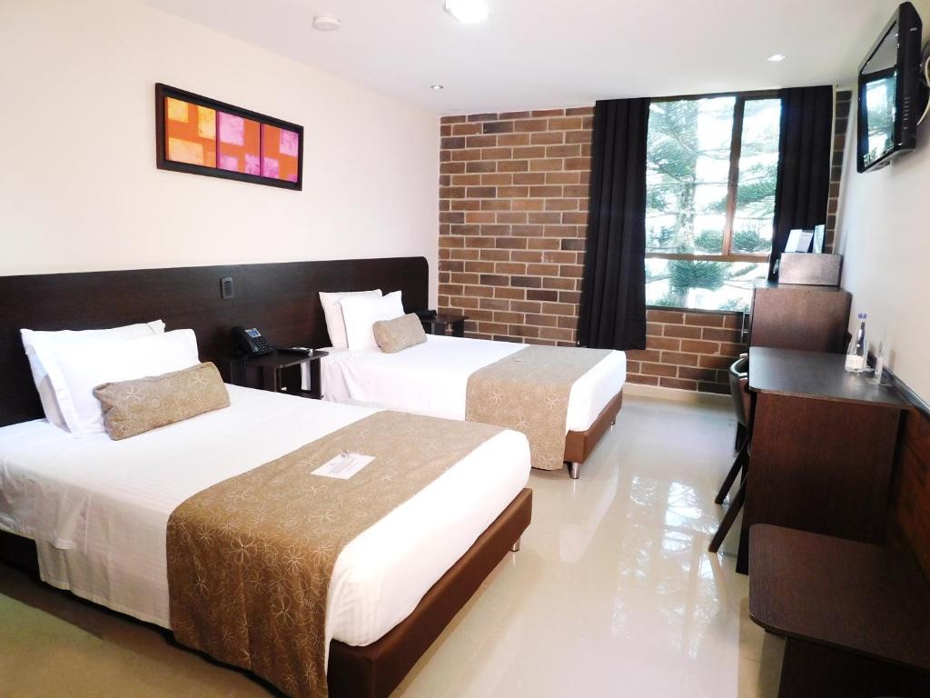 Hotel Acqua Medellin  Rooms  Standard Twin Room 4