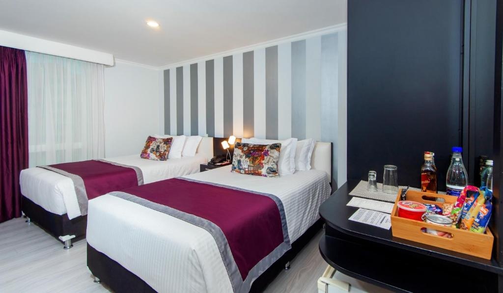 The Morgana Poblado Suites Hotel  Rooms  Premium Triple Suite 4