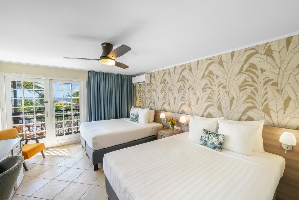 LionsDive Beach Resort  Rooms  Rooms Image 10 10
