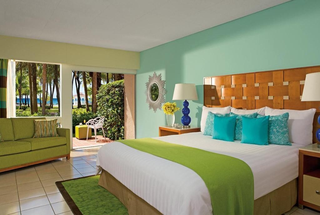 Sunscape Curacao Resort Spa Casino All Inclusive  Rooms  Deluxe Garden View King All Inclusive Bedroom 11