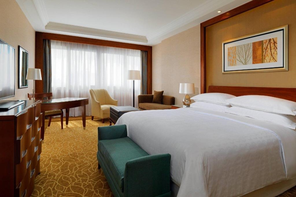 Sheraton Cairo Hotel Casino  Rooms  Deluxe Guest Room 1 King Pool View Balcony Swimming Pool 17