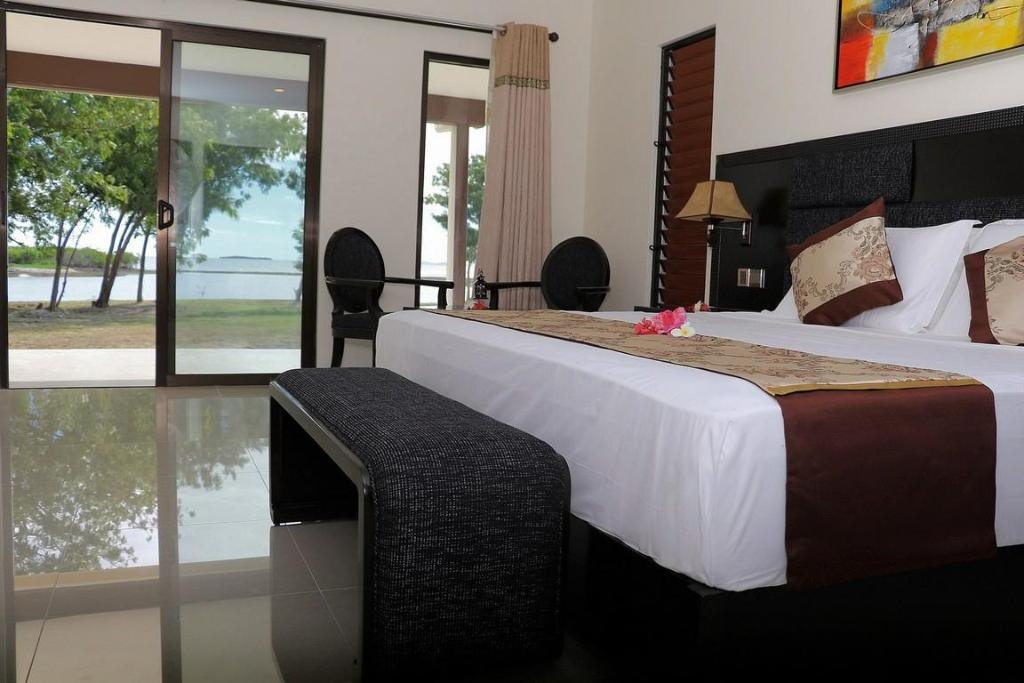 Nila Beach Resort  Rooms  Beach Front King Bed 3