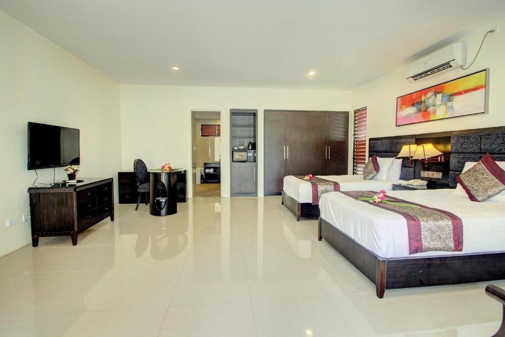 Nila Beach Resort  Rooms  Garden View Twin Room 4