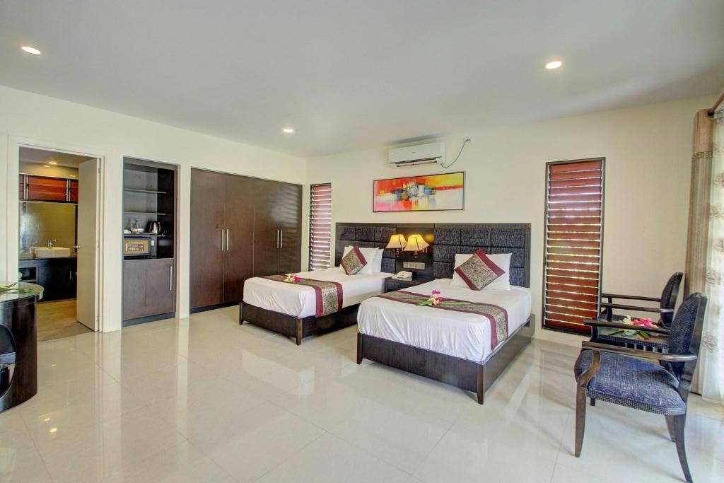 Nila Beach Resort  Rooms  Garden View Twin Room 5