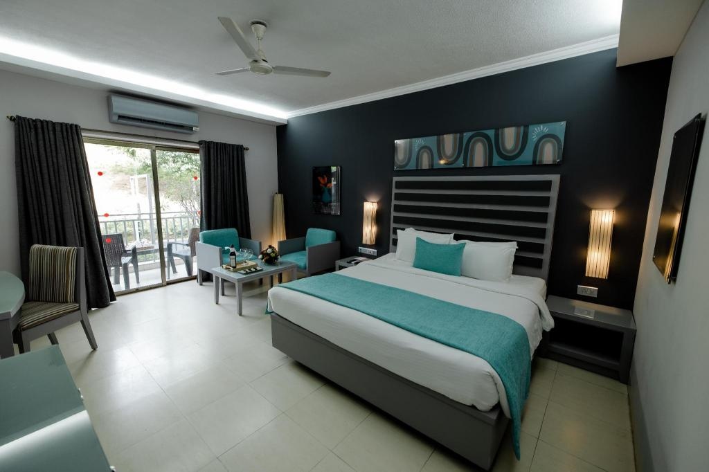 Regenta Baywatch Resort Goa  Rooms  Deluxe Pool View Room Bed 1