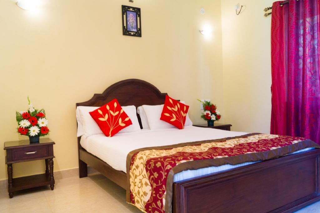 Jacks Resort  Rooms  Deluxe With Balcony Bed 4