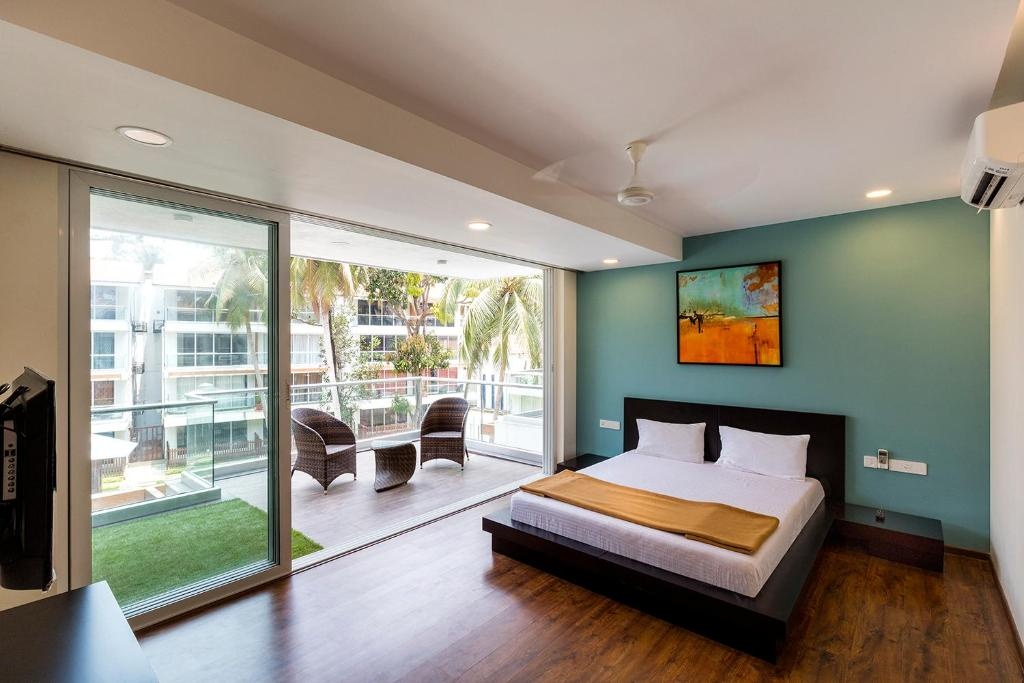 The Eternal Wave By Krish Retreat  Rooms  1 BHK Apartment Pool View Bed 1