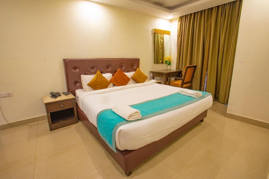 Nitya Resort  Rooms  Deluxe Room Bed 3