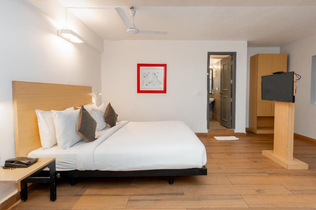 Magnum Resorts Near Candolim Beach  Rooms  Deluxe Room Bed 6