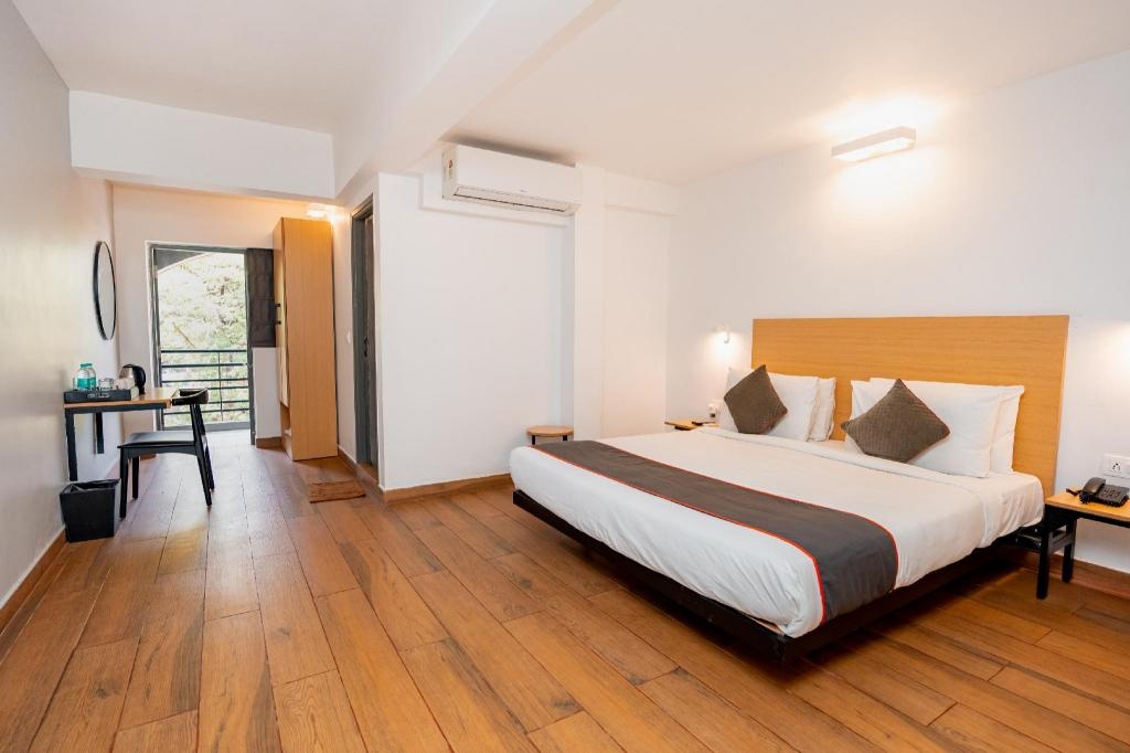 Magnum Resorts Near Candolim Beach  Rooms  Deluxe Room With Balcony View 2