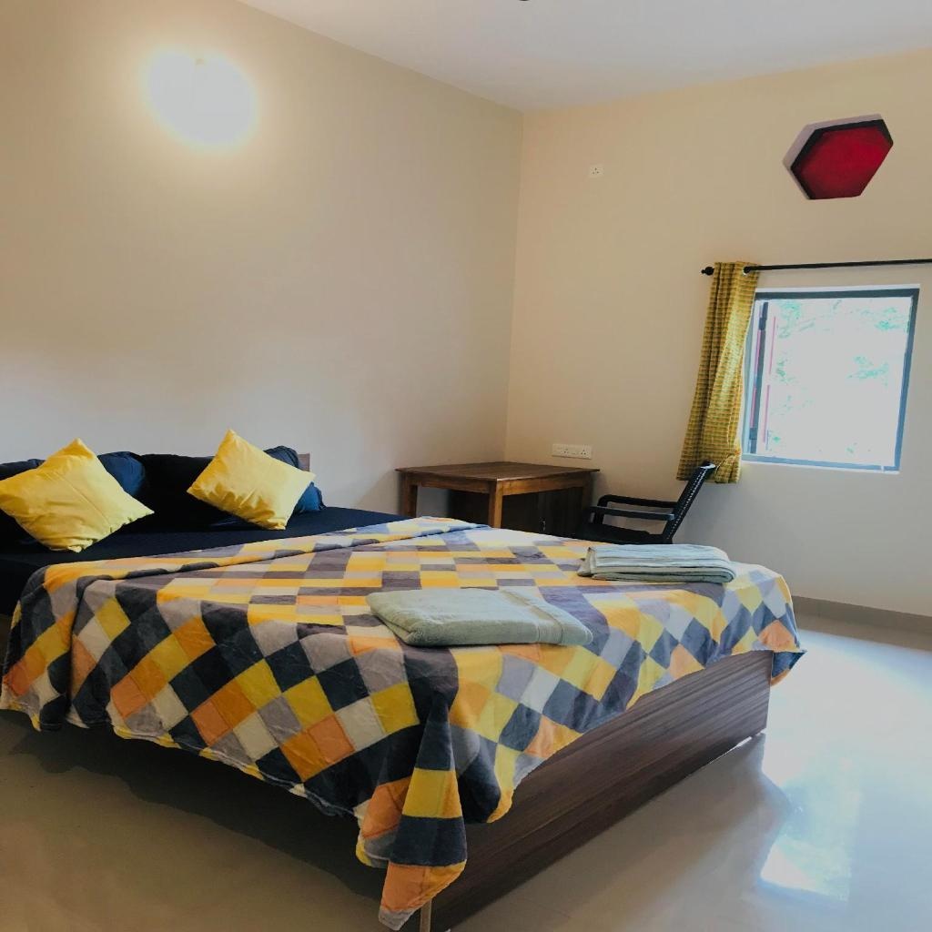 The Nest By Hostelogy  Rooms  Standard Double Room With Shared Bathroom Bed 2