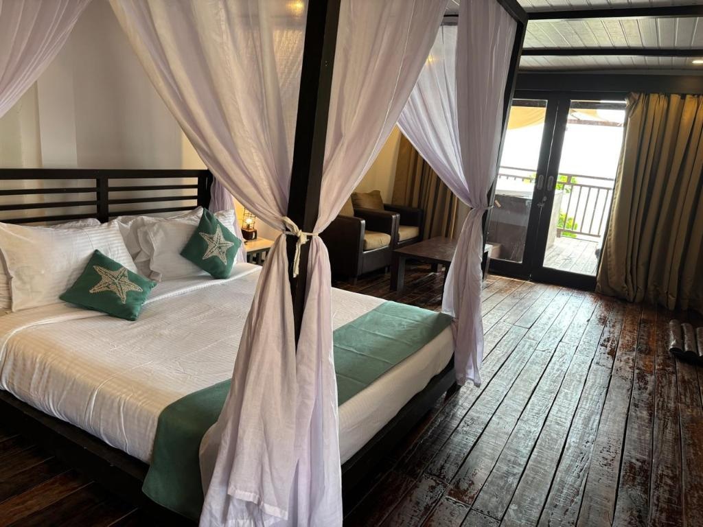 SinQ Beach Morjim  Facilities  Bedroom 6