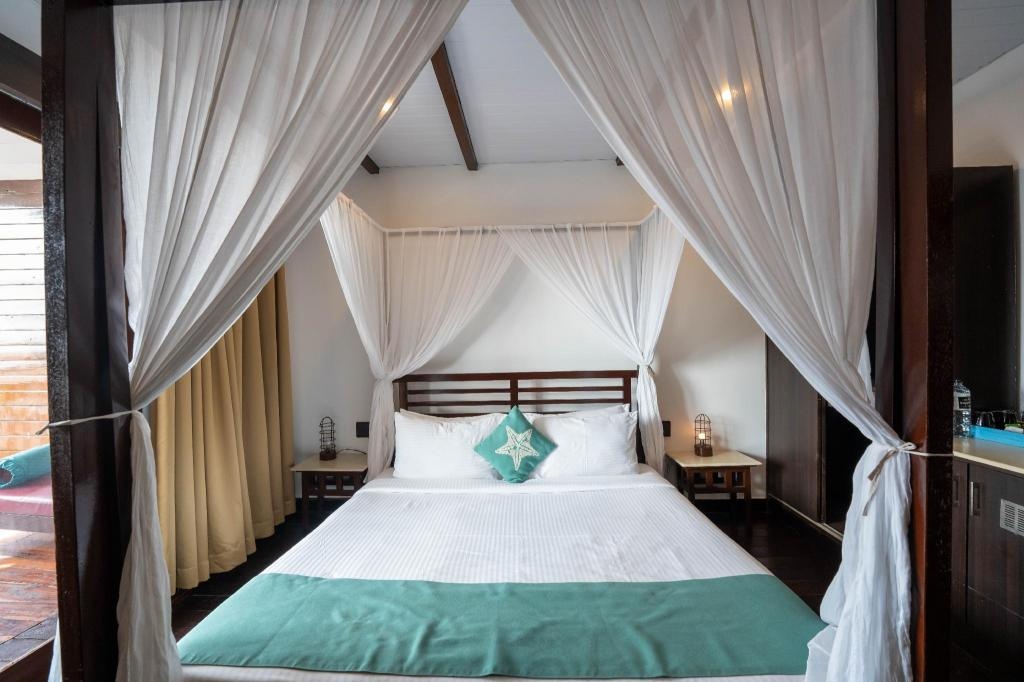 SinQ Beach Morjim  Facilities  Bedroom 9
