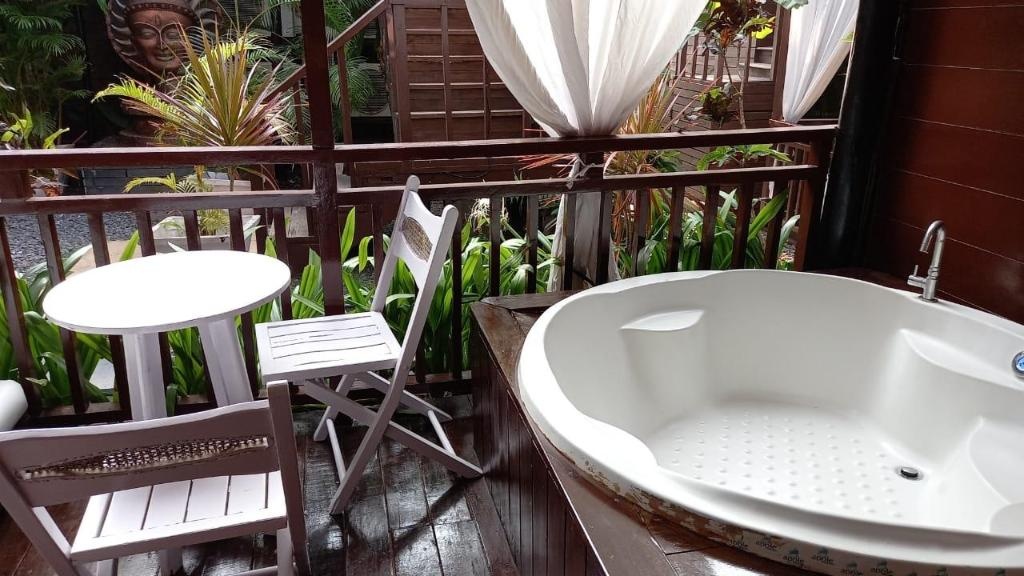 SinQ Beach Morjim  Rooms  Tropical Suite Room Balconyterrace 13