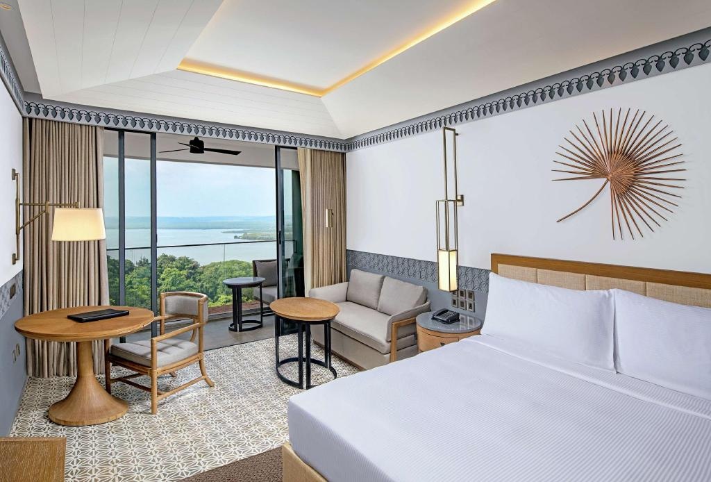 DoubleTree By Hilton Goa Panaji  Rooms  King Deluxe Room River View With Balcony Guestroom 8