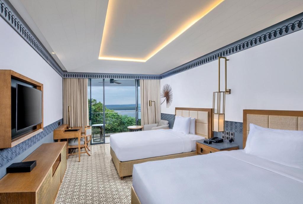 DoubleTree By Hilton Goa Panaji  Rooms  Twin Executive River View With Balcony Bed 11