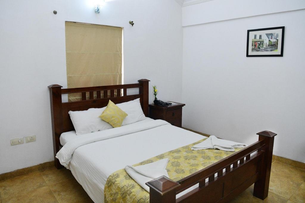 White Square Nirvana Holiday Villas  Rooms  Deluxe Room Bed 4