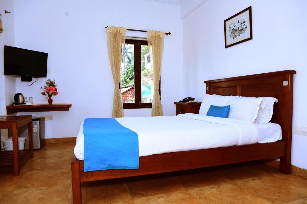 White Square Nirvana Holiday Villas  Rooms  Deluxe Room Bedroom 3