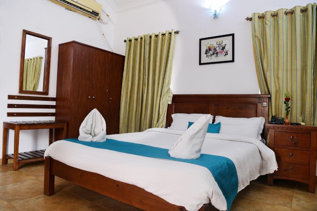 White Square Nirvana Holiday Villas  Rooms  Pool View Villa Bedroom 1