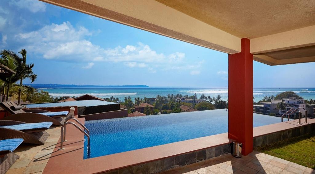 DOLPHIN HEIGHTS Sea View Pool Villa Candolim  Property Views  View 2