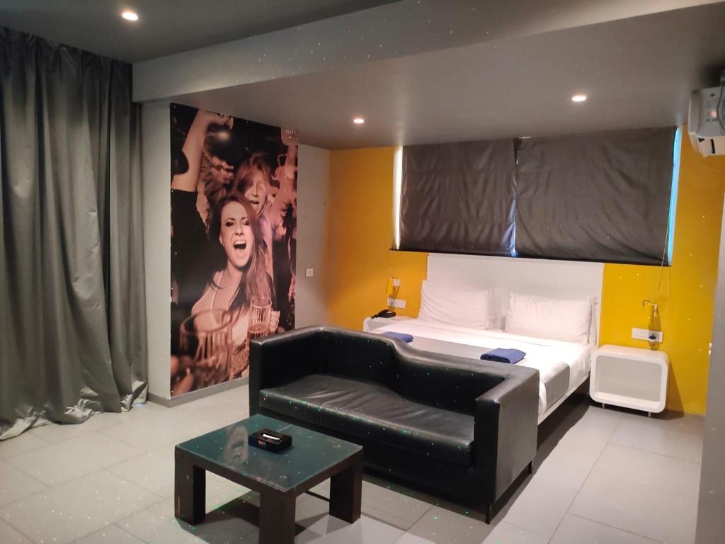 SinQ Party Hotel No Male Stags Allowed  Rooms  Pool View Suite With Balcony Bedroom 12