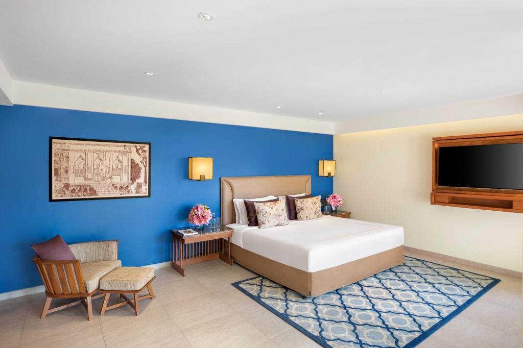 Taj Exotica Resort Spa Goa  Rooms  Premium Room King Bed Sea View Bedroom 27
