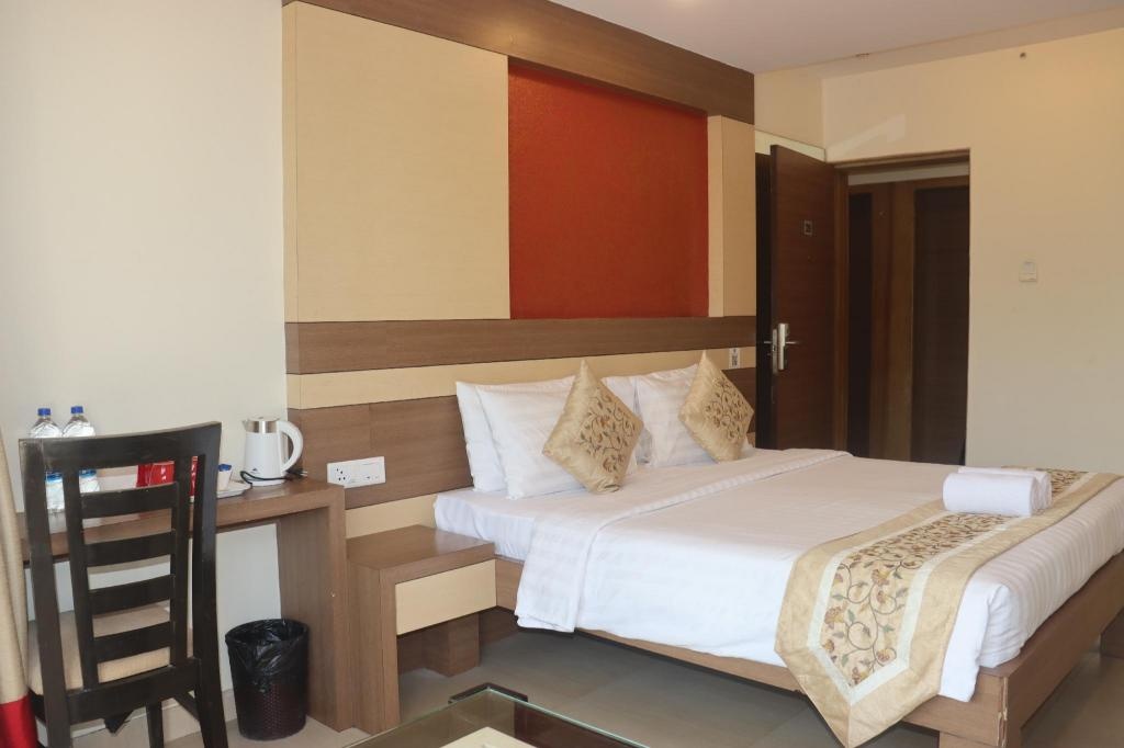 Turtle Beach Resort Morjim  Rooms  Deluxe Room With Balcony Bed 11