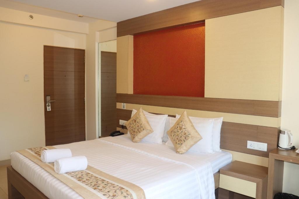 Turtle Beach Resort Morjim  Rooms  Premium Pool View Room With Balcony Bed 6