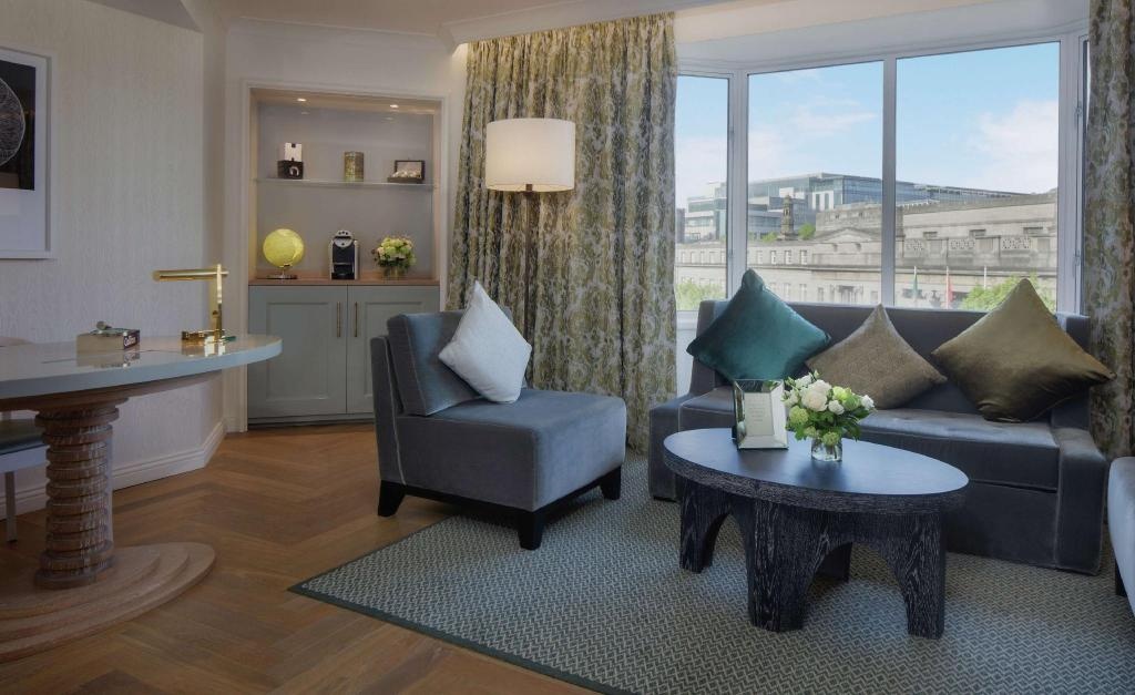 Conrad Dublin  Rooms  Conrad One Bedroom Suite King Bed 72 Sqmtea Nespressolandmark Viewliving Room Bathrobeslippers Guestroom 2