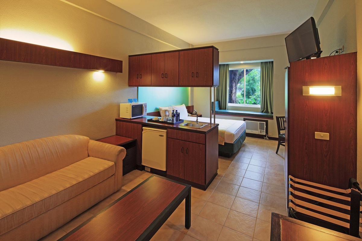 Microtel By Wyndham Tarlac Rooms1 Queen Bed Suite View 2