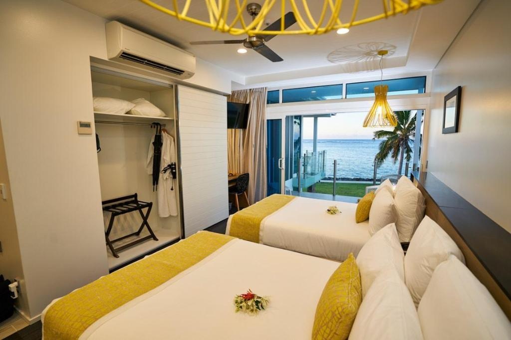 Taumeasina Island Resort  Rooms  Ocean View 2 Double Beds Bed 8