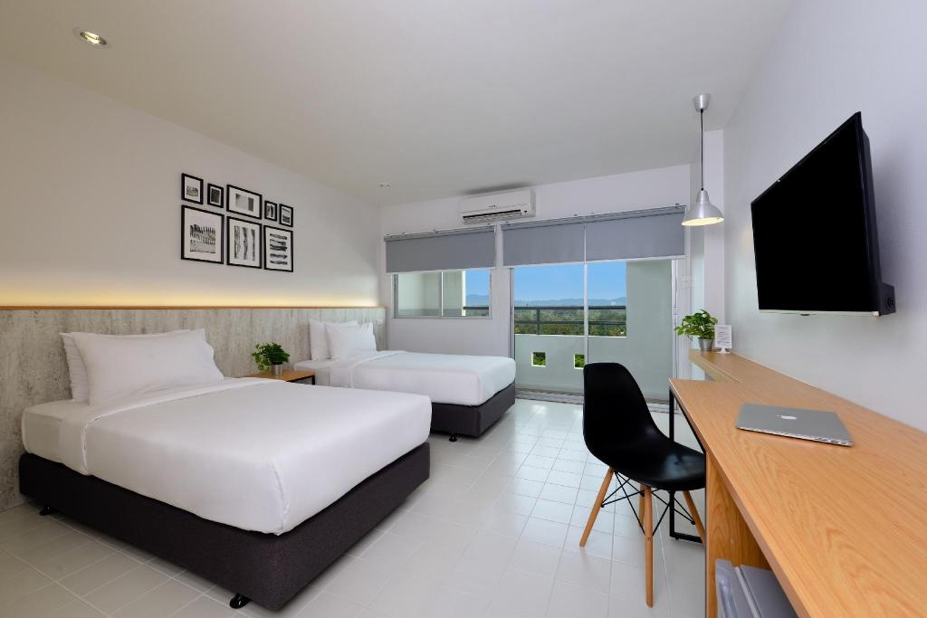 Ruenthip Residence PattayaroomsSuperior City View Twin Room Bed8