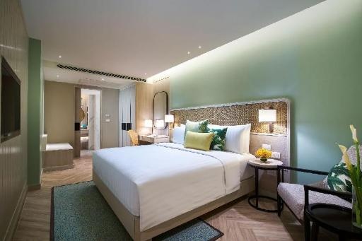 Amari PattayaroomsGrand Amari Suite Bed6