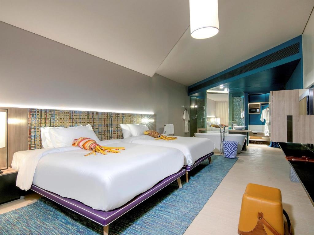 Veranda Resort Pattaya MGalleryroomsSea Breeze Double Queen 2 Queen Size Beds Garden View Guestroom13