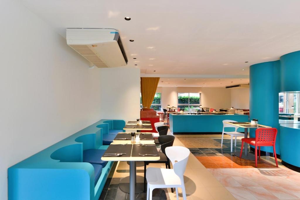 The Grass Serviced Suites By At MinddiningFood And Beverages34