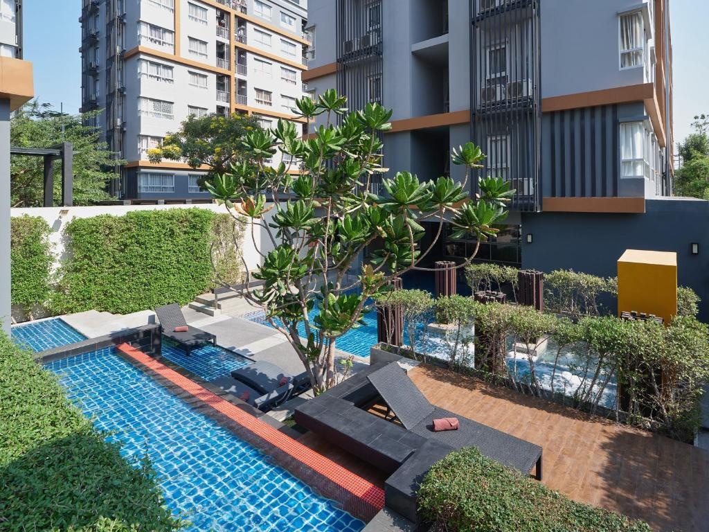 The Grass Serviced Suites By At MindfacilitiesSwimming Pool Outdoor16