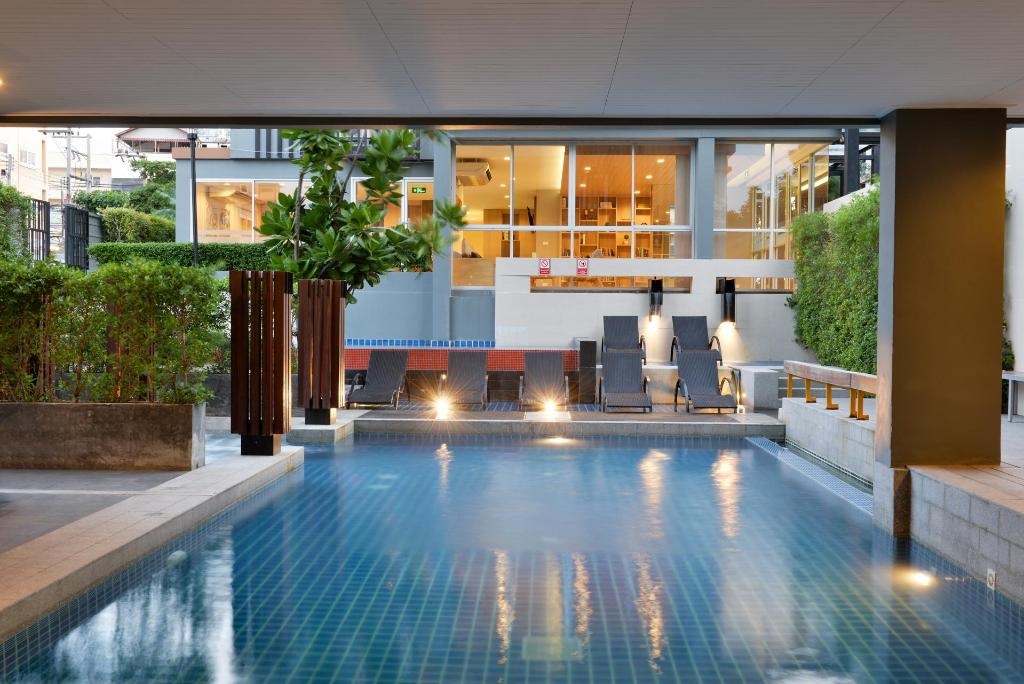 The Grass Serviced Suites By At MindfacilitiesSwimming Pool5