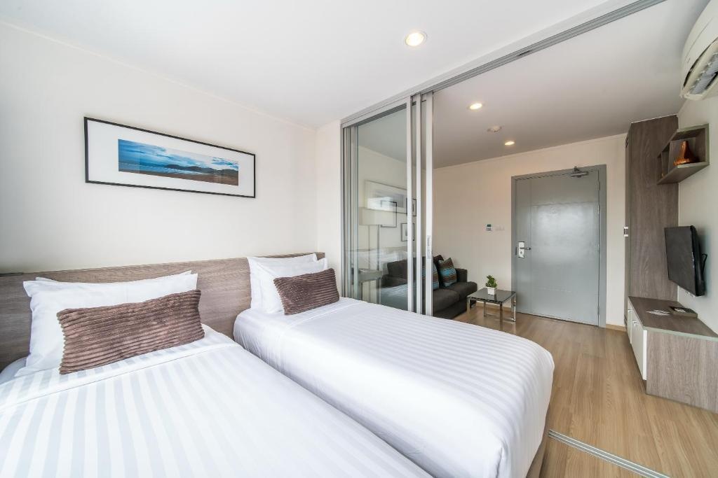 The Grass Serviced Suites By At Mindroomsrooms Image 1414