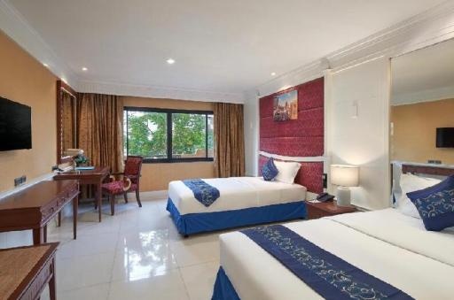 Fairtex Sports Club HotelroomsDeluxe Room Bed1