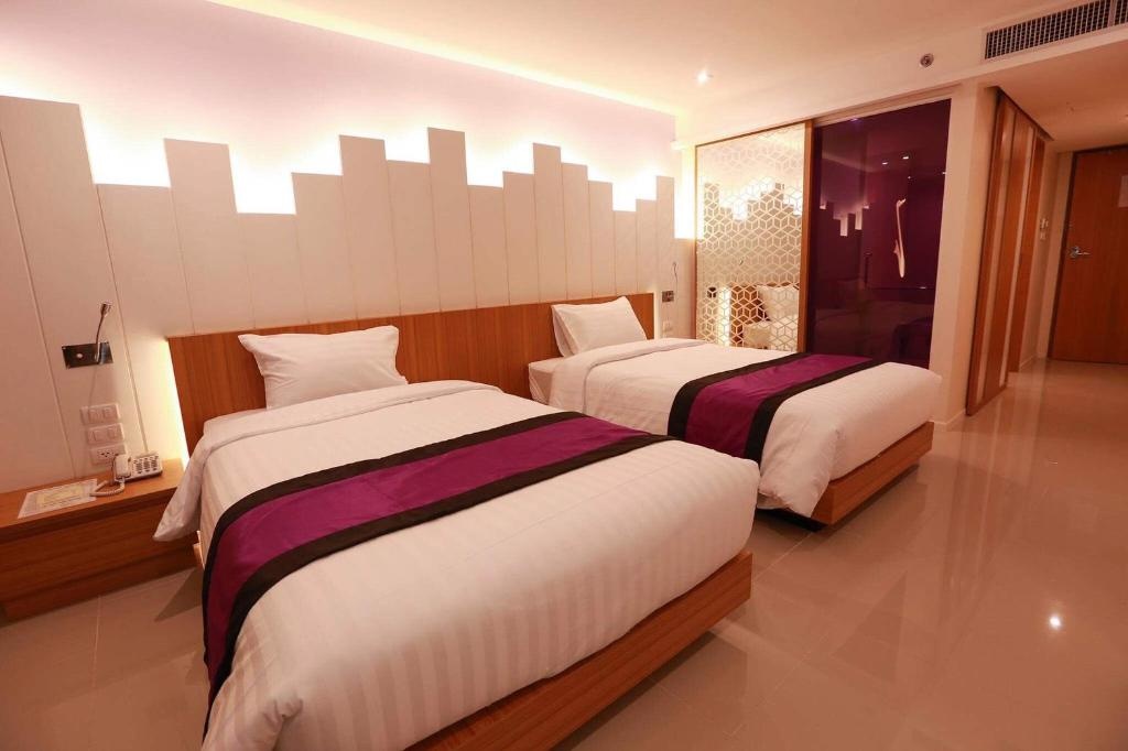 The Whisper HotelroomsDeluxe Twin Guestroom1