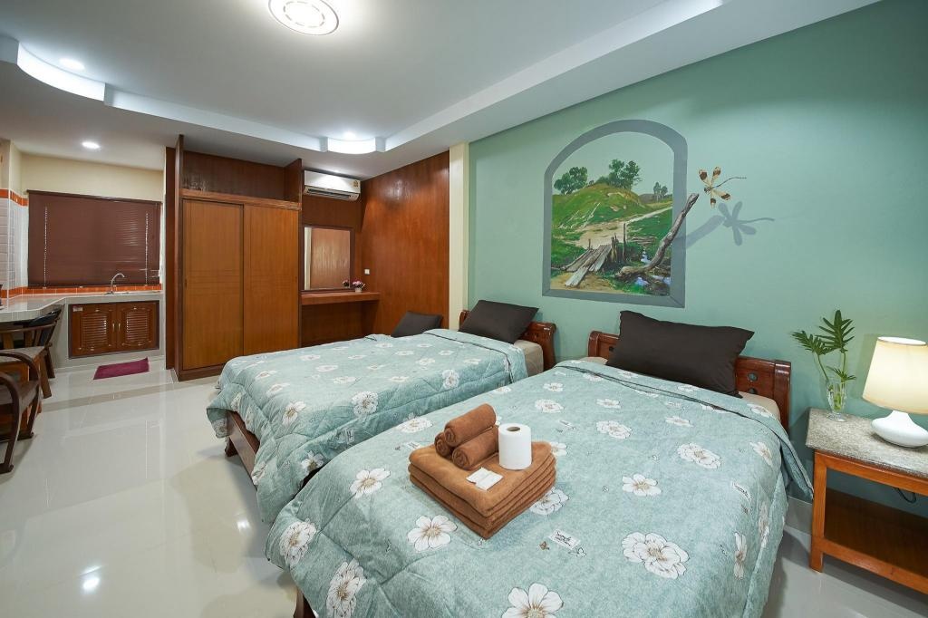Suan Palm ResortroomsTriple Room 3 Beds Bedroom2