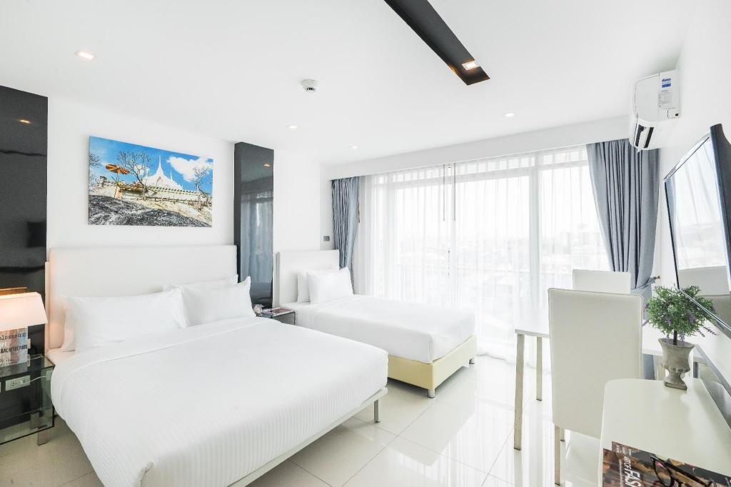 CCR Managed By AHA SmartstayroomsSuperior Triple Room Plan2