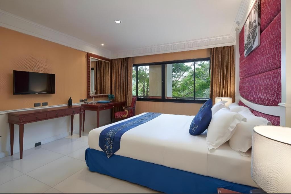 Fairtex Sports Club HotelroomsDeluxe Room Bed3