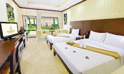 Thai Garden Resort PattayaroomsDeluxe Room Twin Bed Bed1