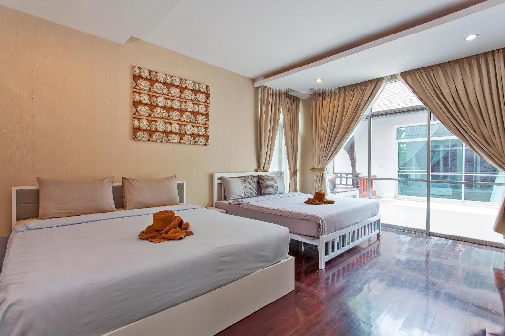 Nagawari 8 Luxury 6BR Pool Villa In Na JomtienfacilitiesBedroom2