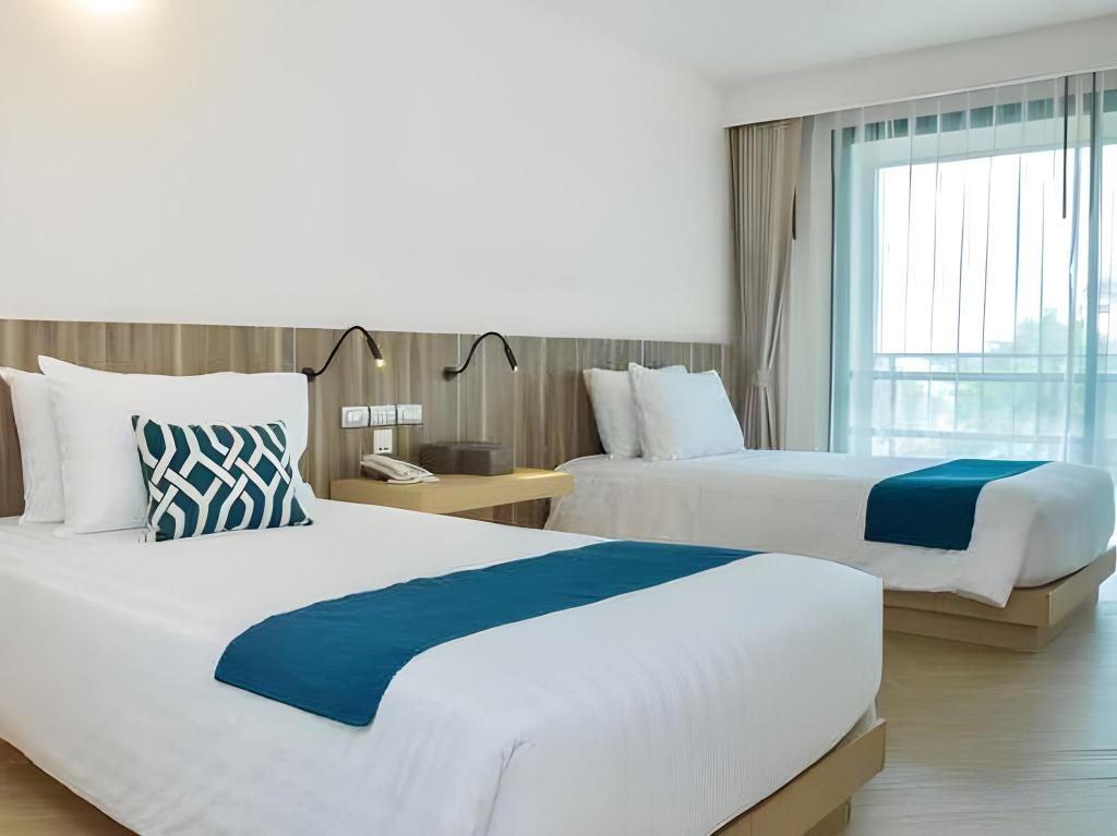 Golden Tulip Pattaya Beach Resortroomsrooms Image 2828