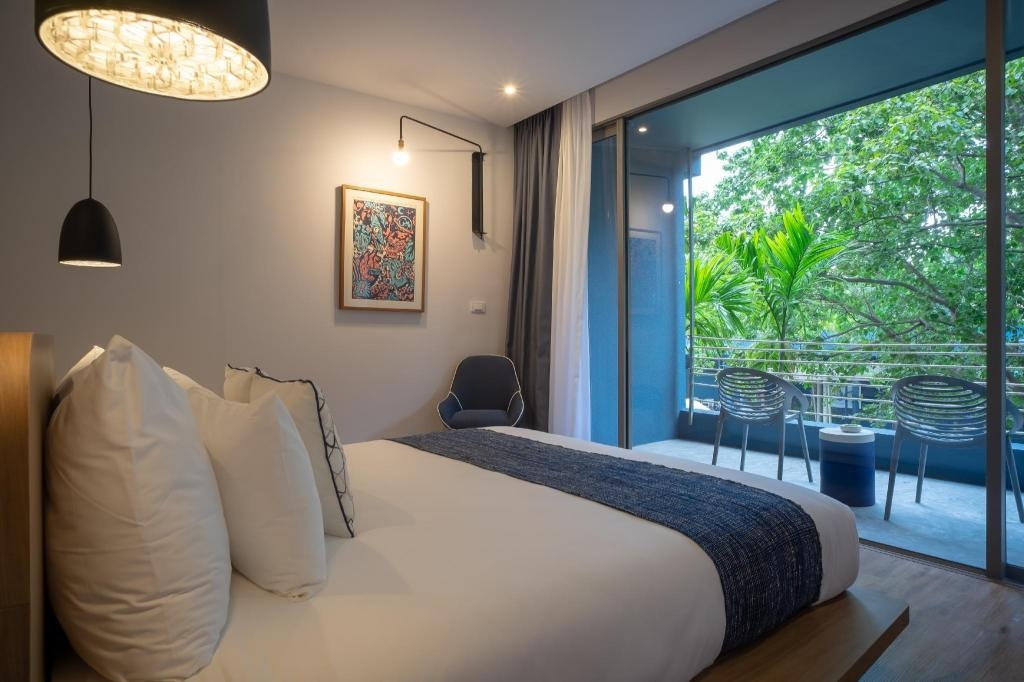 Navana Nature EscaperoomsDeluxe Room Bed17