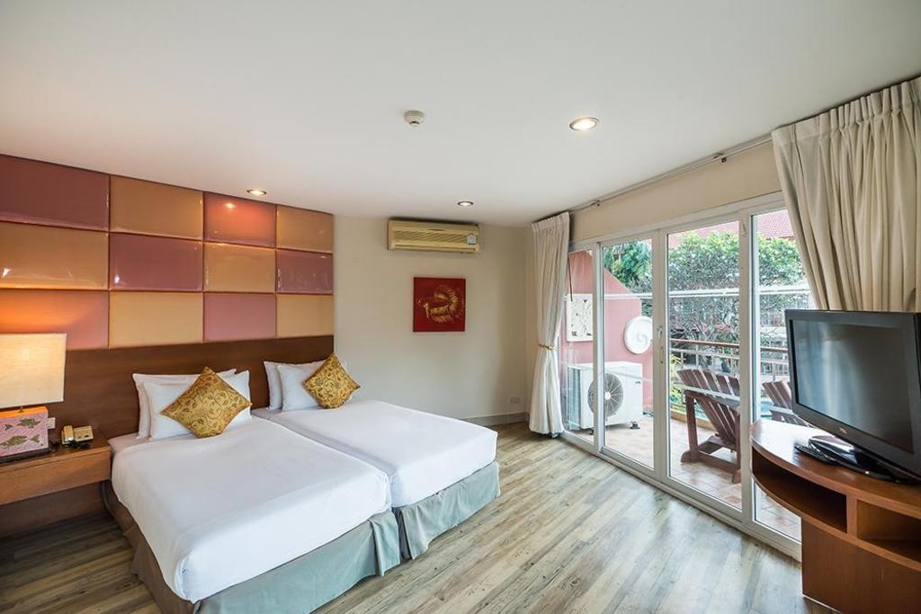 Bella Villa CabanaroomsPresidential Suite B Bed26